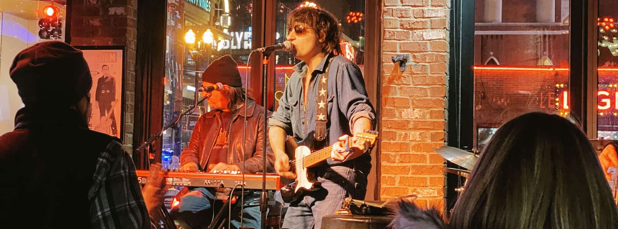 bar singer on guitar in Oklahoma City